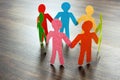 Circle of colored paper men. Diversity and inclusiveness concept. Royalty Free Stock Photo