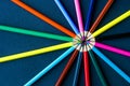 Circle of colour pencils on black background.Close up. Many different colored pencils on dark purple background.Colorful pencil Royalty Free Stock Photo