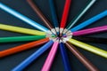 Circle of colour pencils on black background.Close up. Many different colored pencils on dark purple background.Colorful pencil Royalty Free Stock Photo