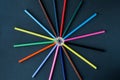 Circle of colour pencils on black background.Close up. Many different colored pencils on dark purple background.Colorful pencil Royalty Free Stock Photo