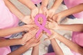 Women Hands Holding Pink Breast Cancer Ribbon Standing Together Royalty Free Stock Photo