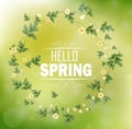 Circle floral frame with text hello spring and bokeh background Royalty Free Stock Photo