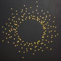 Circle Frame of golden stars scattered on black background Royalty Free Stock Photo