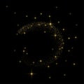 Circle of golden glittering particles with star light trail . Magic sparkling lines. Royalty Free Stock Photo