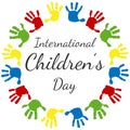 A circle of handprints with a text inside International Children`s Day. Icon of colored prints of kid`s hands on the Happy Childre