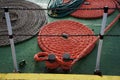 Circle hanks of rope on deck of fishing boat Royalty Free Stock Photo