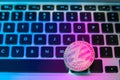 Circle Litecoin, lite coin on top of computer keyboard buttons. Digital currency, block chain market, online business