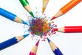 color pencils in a radial shape and crayon shaving Royalty Free Stock Photo