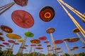 Circle made of silk, a variety of colors, in the midst of the sky. Royalty Free Stock Photo