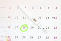 Circle marked on a calendar and pregnancy test