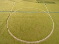 Circle in middle of court. Empty outdoor handball playground, plastic light green surface Royalty Free Stock Photo