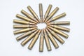 circle of old rifle cartridges 5.56 mm on a white background Royalty Free Stock Photo