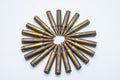 Circle of old rifle cartridges 5.56 mm on a white background Royalty Free Stock Photo