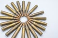 Circle of old rifle cartridges 5.56 mm on a white background Royalty Free Stock Photo