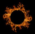 Circle of orange flame isolated on black