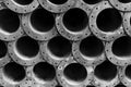 Circle pattern of rusty steel pipes in black and white Royalty Free Stock Photo