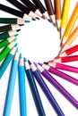 Circle or rainbow swirl of colored pencils on white background, copy space, mock up, LGBT symbol, horizontal Royalty Free Stock Photo