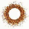 Circle shape frame of crushed red cayenne pepper, dried chili flakes and seeds isolated on a white background. Homemade spices