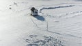 Circling around the icefishing hut with a drone and showing all different tracks left in the snow by people in Oka