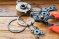 Circlip Pliers external straight and External retaining ring on wooden background Royalty Free Stock Photo