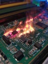 Circuit Board Malfunction Causing Sparks and Flames During Sudden Electrical Failure Near Empty Space Royalty Free Stock Photo