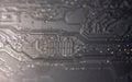 Circuit board with microelectronics chip. Circuit board in pcb macro. Circuit board for computing electronics. Circuit board as Royalty Free Stock Photo