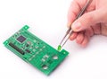 Circuit board and tweezers Royalty Free Stock Photo