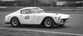 Black and white picture of a white Ferrari 250 GT Berlinetta in a classic car race at the Jarama circuit Royalty Free Stock Photo