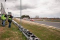 Press photographers at the exit of a curve in a classic car race Ferrari 512 BB LM, Porsche 934, BMW M1