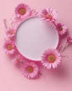 A circular arrangement of pink gerbera daisies and petals on a soft pink background Royalty Free Stock Photo