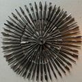 A circular arrangement of various screwdriver bits radiates from a central point Royalty Free Stock Photo