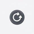 Circular arrow icon on gray button, symbolizing refresh or reload Royalty Free Stock Photo