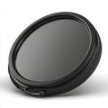 Circular black neutral density filter with a textured rotating ring Royalty Free Stock Photo
