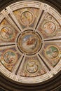 The circular chapel is decorated with at the center of the vault shows the creation of the world Royalty Free Stock Photo