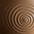 Circular concentric ridges create a three-dimensional, spiral pattern in a clay surface. Royalty Free Stock Photo