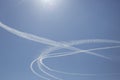 circular condensation trail made from aerial patrol jets Royalty Free Stock Photo