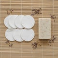 Circular cotton pads and a rectangular Royalty Free Stock Photo