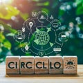 Circular economy concept. Wooden blocks with icons. Electric energy. Electric trains, wind energy, solar energy. Royalty Free Stock Photo