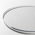 Circular glass object with a flat surface featuring visible scratches Royalty Free Stock Photo