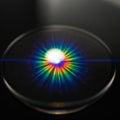 A diffraction pattern showcasing a spectrum of colors radiating outward Royalty Free Stock Photo