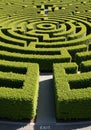 Circular hedge maze featuring well-maintained green shrubs Royalty Free Stock Photo