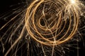 Circular lights with sparks on a black background