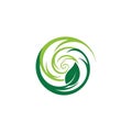 A circular logo design featuring two shades of green forming a swirling pattern. A Royalty Free Stock Photo