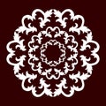 A circular pattern of white color on a dark red background