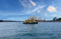 Circular Quay and Sydney Rocks Ferry on Sydney Harbour NSW Australia. Lovely colours of the Sky and water Royalty Free Stock Photo