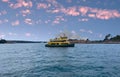 Circular Quay and Sydney Rocks Ferry on Sydney Harbour NSW Australia. Lovely colours of the Sky and water Royalty Free Stock Photo