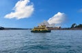 Circular Quay and Sydney Rocks Ferry on Sydney Harbour NSW Australia. Lovely colours of the Sky and water Royalty Free Stock Photo