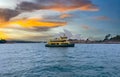 Circular Quay and Sydney Rocks Ferry on Sydney Harbour NSW Australia. Lovely colours of the Sky and water Royalty Free Stock Photo