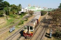 Circular Railway Train leaves Yangon Central Railway Station in Royalty Free Stock Photo