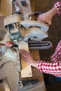Circular Saw. Carpenter Using Circular Saw for wood, woodworking Royalty Free Stock Photo